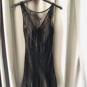 Fitted black lace dress